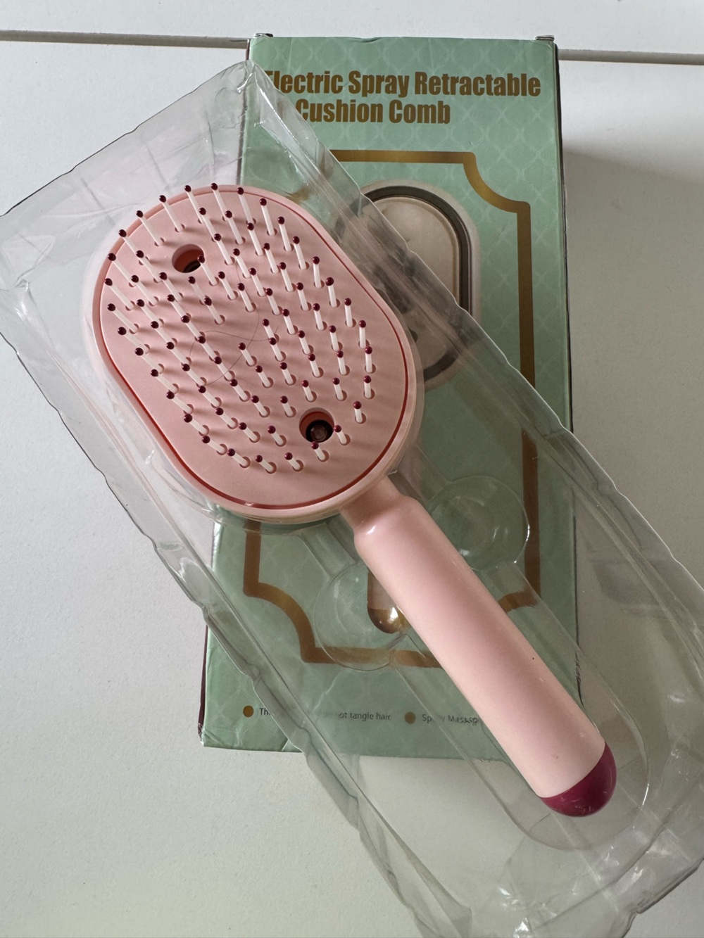 Amazon Electric Spray Retractable Air Cushion Comb - Pink